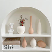 Pale White and Orange Ceramic Vase Collection