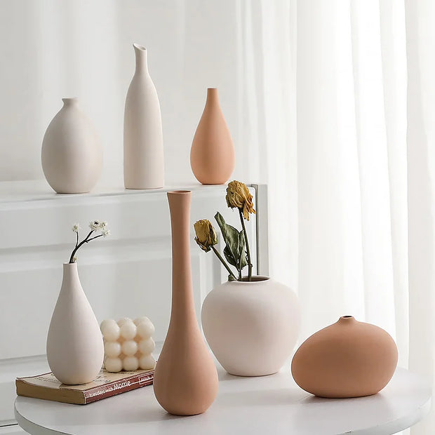 Pale White and Orange Ceramic Vase Collection