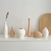 Pale White and Orange Ceramic Vase Collection